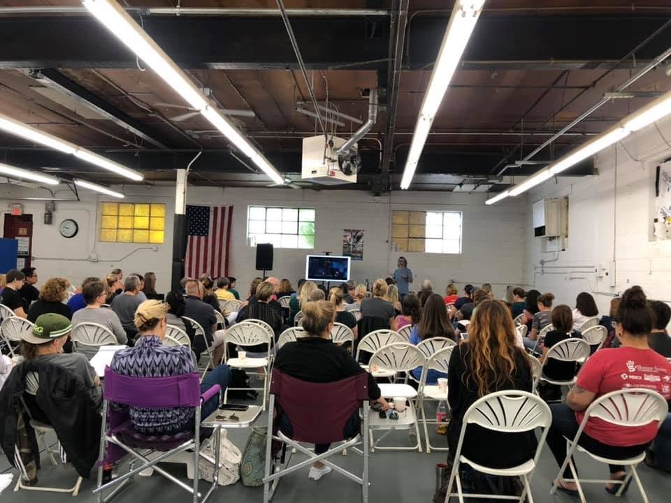 John McGuigan presenting to a full dog behaviour seminar room
